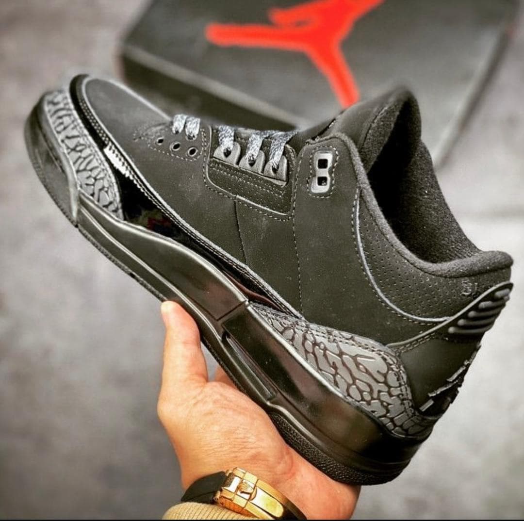 All black Nike shiny sole